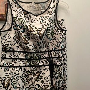 Cute two-piece multicolor, knee length skirt and top.